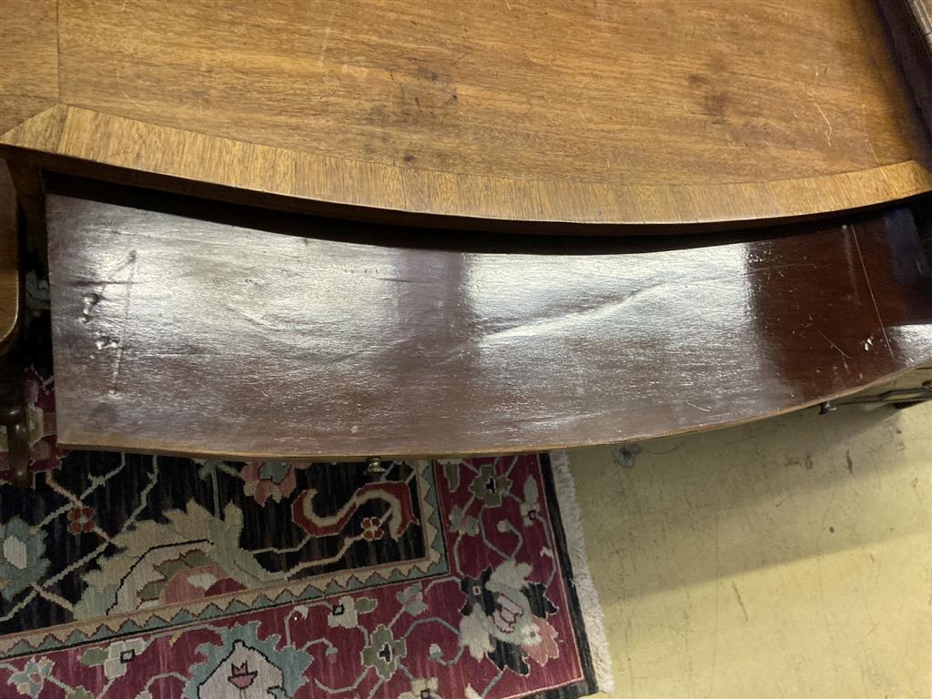A Regency mahogany bowfront chest, fitted brushing slide, width 96cm, depth 49cm, height 86cm